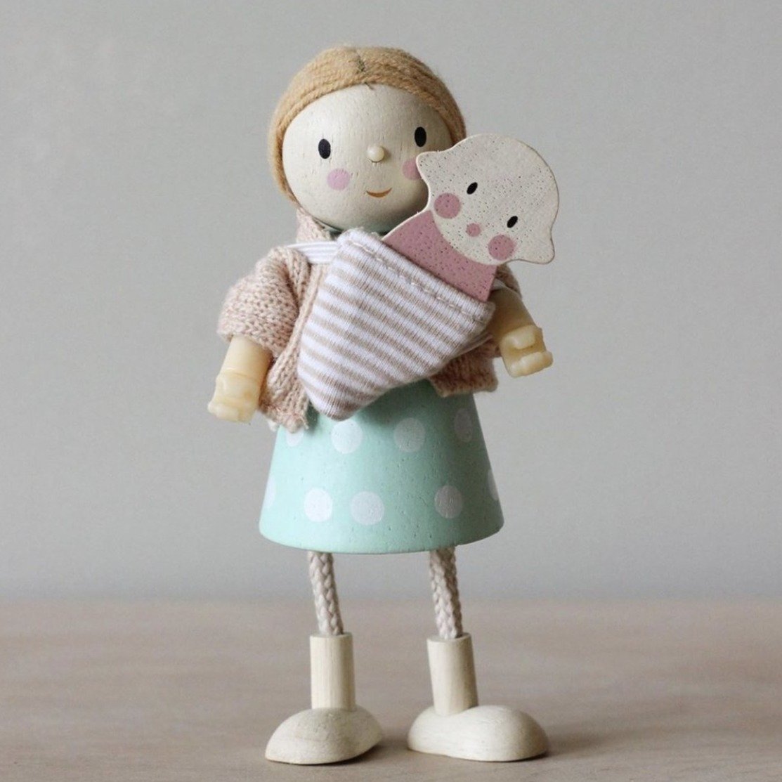 Baby Wearing Wooden Doll